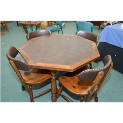 Octagonal games table with simulated leather top and four chairs