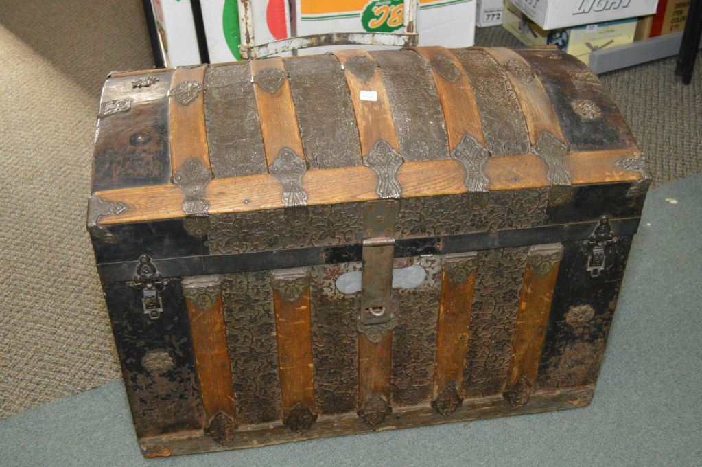 Vintage dome top steamer trunk with oak and metal binding