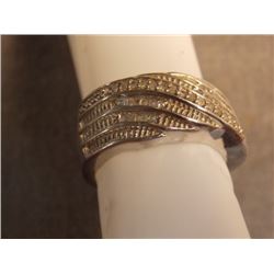 RING - DIAMOND-SET BAND STYLE RING - 0.20 CTW DIAMONDS APPROX. - STERLING SILVER SETTING