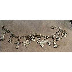 BRACLET - HIGH INTENCITY - WITH 10 ASSORTED SILVER CHARMS