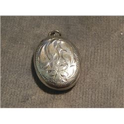 LOCKET - ETCHED FLORAL DESIGN ON FRONT - "STERLING" ON BACK