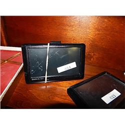 GARMIN GPS - WITH STAND - PS - sold as-is - no warranty or guarantee