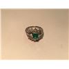 Image 1 : LADIES PLATINUM AND DIAMOND EMERALD DRESS RING. CENTER SET WITH ONE 0.5CT NATURAL