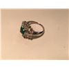 Image 2 : LADIES PLATINUM AND DIAMOND EMERALD DRESS RING. CENTER SET WITH ONE 0.5CT NATURAL