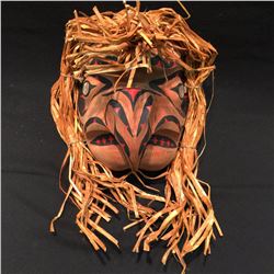 BRAD BAZILLE, 'HAWKMAN' HAND CARVED CEDAR MASK WITH ABALONE EYES AND CEDAR STRIP ACCENTS, 19'' H X