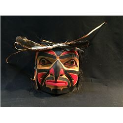 MELANIE CLOUTIER, 'HAWKMAN' HAND CARVED CEDAR MASK WITH HORSE HAIR AND FEATHER ACCENTS, KIL WAT