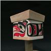 Image 2 : RICHARD SHORTY, 'WOLF, RAVEN, AND SUN' HAND CARVED RATTLE WITH BASE, YUKON, 11'' H X 6'' W