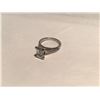 Image 1 : LADIES PLATINUM DIAMOND ENGAGEMENT RING.  SET WITH A CUT CORNERED RECTANGULAR STEP CUT DIAMOND