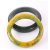 Image 5 : Two (2) Bakelite swirl bangles.  Bakelite is an early
