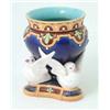Image 1 : A Minton majolica bowl, in the form of a blue-glazed jardiniere supported by three swans, on trif...
