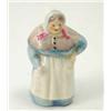 Image 1 : A Royal Worcester candle extinguisher, modelled as a Dickensian woman wearing head-dress, cape an...