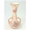 Image 1 : A Royal Worcester vase, two-handled with tall waisted neck, painted with flowers against an ivory...