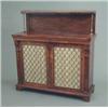 Image 1 : A Regency rosewood chiffonier, with brass railed shelf on baluster supports and two doors, with b...