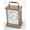 Image 1 : A late 19th century brass carriage clock, with enamelled dial and French movement with 'postman's...