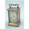 Image 1 : A 20th century architectural brass repeating carriage clock, with enamelled dial, signed Chas. Fr...