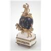 Image 1 : A French late 19th century ebonised and gilt bronze mantel timepiece, in the form of a globe supp...