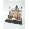 Image 1 : A French late 19th century brass novelty marine clock, in the form of a ships deck, with a seaman...
