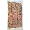 Image 1 : A Tekke Turkoman rug, circa 1910, the "washed" pink field with two columns of eight guls, 5ft 3in...
