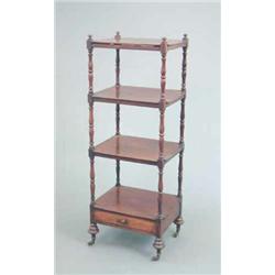 An early Victorian mahogany four tier whatnot, with turned uprights and base drawer on toupie leg...
