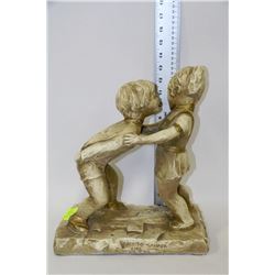 LARGE ABBOTT OF CANADA STATUE-BOY TRYING TO KISS