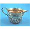 Image 1 : A Victorian spiral fluted silver milk jug....