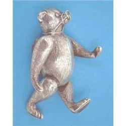 An Edwardian novelty silver articulated bear pin cushion with ring through his muzzle, Birmingham...