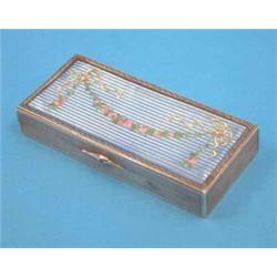 A Continental enamelled silver trinket box decorated with ribbon tied rose garlands, 3 ins....