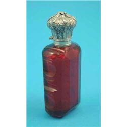 A Victorian silver mounted ruby glass scent bottle....