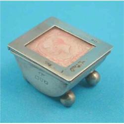 A George V silver stamp case with glazed lid and ball feet, Chester 1913, 1.25 ins....