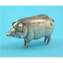 An engine turned silver snuff box and an agate and silver matchbook case....