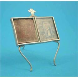 A Late Victorian silver miniature double photograph frame with Prince of Wales feathers crest, 3....