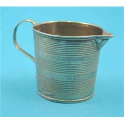 A George III silver cream jug....