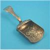 Image 1 : A George III silver gilt caddy spoon of shovel form with vineous decoration, Birmingham 1813....