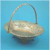 Image 1 : An Elkington's plated bread basket of oval form with swing handle....