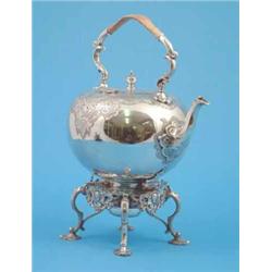 A Victorian plated kettle on stand of globular form with foliate scroll engraving....