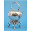 Image 1 : A Victorian plated kettle on stand of globular form with foliate scroll engraving....