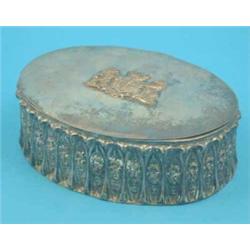 A Continental plated oval casket with coat of arms decoration, 9 ins....