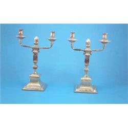 A pair of 19th century Continental silver candelabra with acanthus sconces, foliate scroll branch...