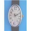 A gentleman's silver Art Deco wrist watch of curved oval form with silvered Arabic dial and blued...