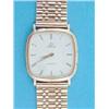 Image 1 : A gentleman's 9ct. gold Omega quartz wrist watch with rounded square dial and flexible bracelet....
