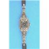 A lady's paste set platinum wrist watch....
