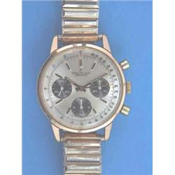 A gentleman's gold plated Breitling wrist chronograph with silvered dial and black subsidiary dia...