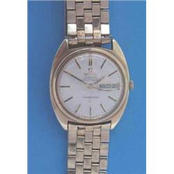 A gentleman's gold plated Omega Constellation wrist watch with day/date dial....