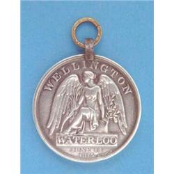 A Waterloo medal to Alexander Cameron 1st Bat. 92nd Highlanders, original iron clip but replaced...