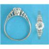 Image 1 : An 18ct white gold and platinum solitaire diamond ring, the stepped shoulders set baguette cut di...