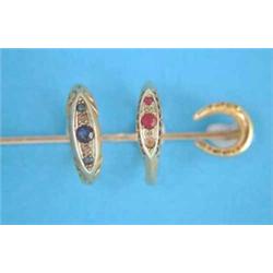 An 18ct gold horseshoe stick pin, a gold 5-stone sapphire and diamond ring and a similar ruby and...