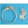 Image 1 : An 18ct white gold 2-stone diamond cross over ring, the brilliant cut stones approximately .6ct e...