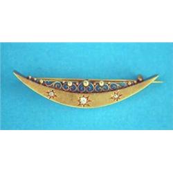 A Victorian 15ct gold crescent moon brooch, gypsy set 3 diamonds...
