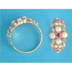 A Victorian design gold ring, set split pearls, rubies and small diamonds, stamped 15ct...