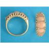 Image 1 : An 18ct gold half hoop ring, set 5 oval corals and diamond points...